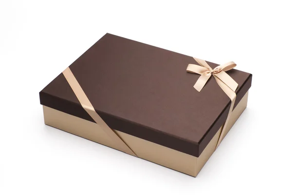 hediye kutusu tarafından Sarı bandın üzerine beyaz izole bir yay ile sarılmış.