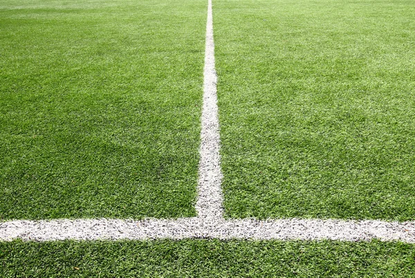 Campo de futebol grama no canto verde . — Fotografia de Stock