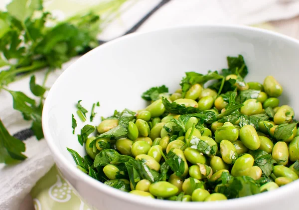 Edamame soy beans salad with parsley — Stock Photo, Image