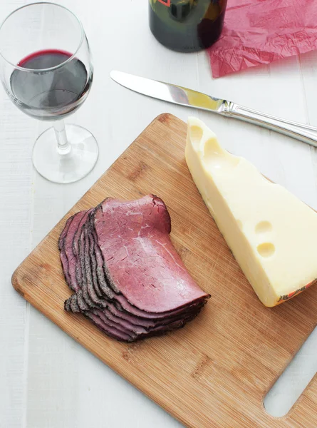 Deli meat pastrami and chunk cheese top view — Stock Photo, Image