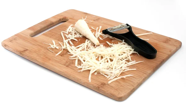 Julienne cut parsnips with peeler isolated — Stock Photo, Image