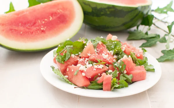 Plate with juicy watermelon salad