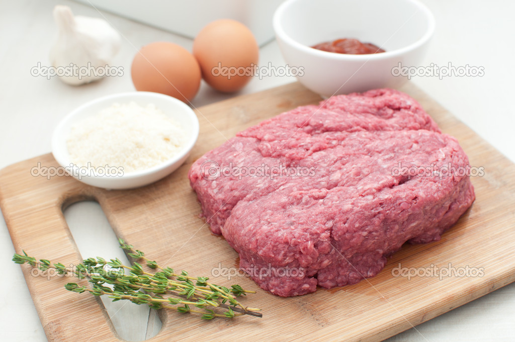 Ground meat for meatloaf with other ingredients