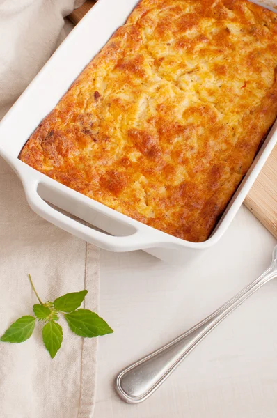 Dish with cheese and herbs — Stock Photo, Image