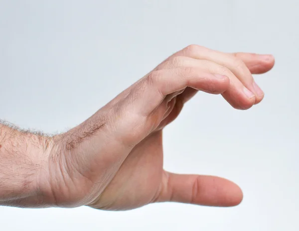 Mannen hand aanraken van iets — Stockfoto