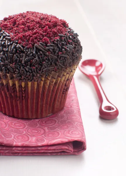 Chocolate muffins with red sugar decoration — Stock Photo, Image