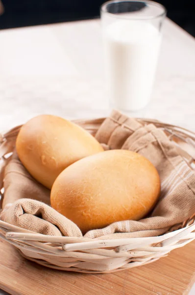 Baked dinner rolls with milk — Stock Photo, Image