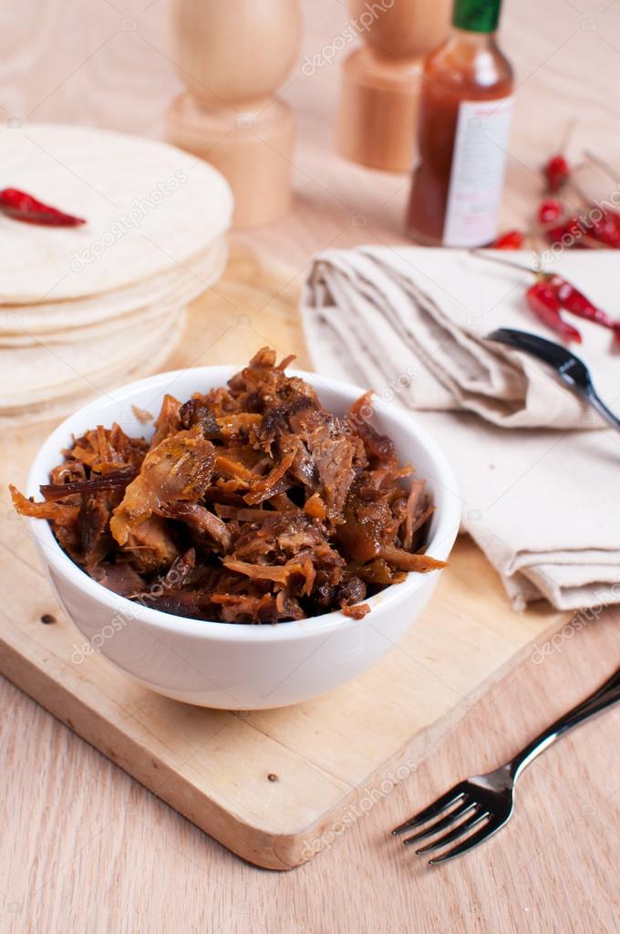 Slow cooked pulled meat pork and tortillas pitas