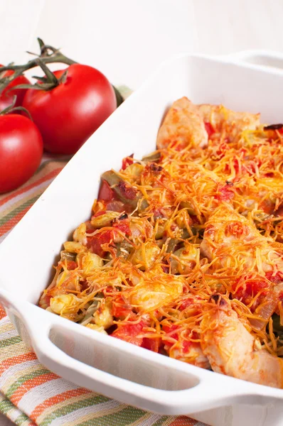 Tomatoes, chicken and cheese casserole — Stock Photo, Image