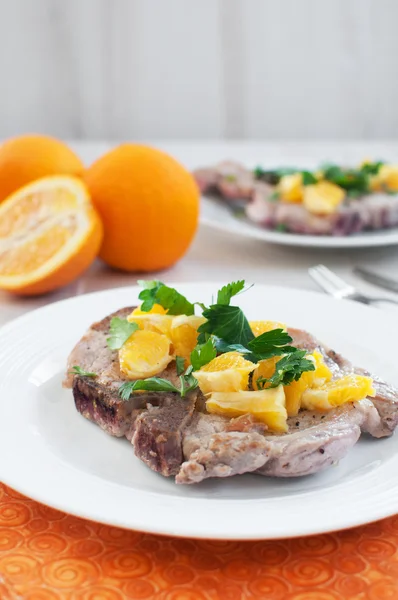 Pork dinner with oranges sauce — Stock Photo, Image