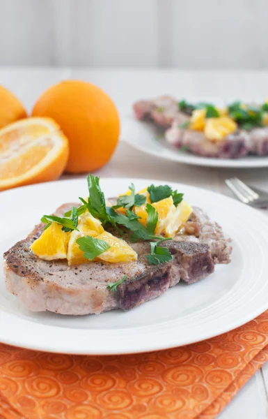 Fried pork chops with citrus sauce — Stock Photo, Image