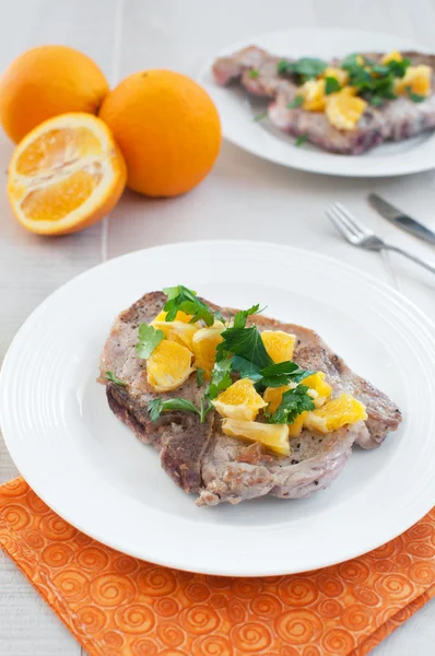 Fried pork meat with citrus salsa — Stock Photo, Image