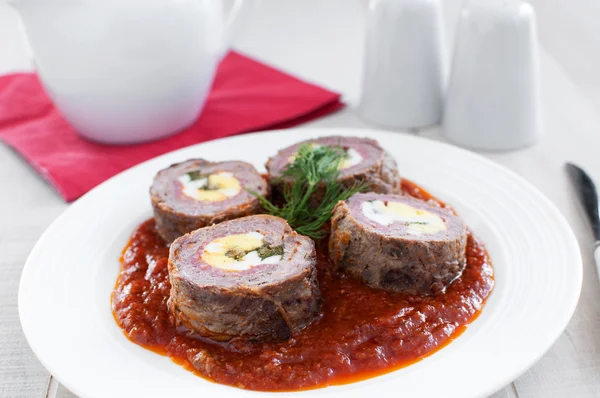 Stuffed meat roulade with eggs, salami — Stock Photo, Image