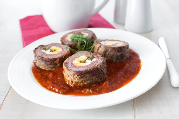 Braciole roll from meat, eggs and salami — Stock Photo, Image