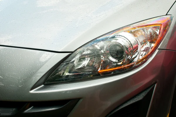 Headlight of grey car — Stock Photo, Image