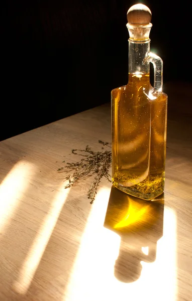 Golden olive oil in sun light — Stock Photo, Image