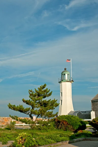 Lighthouse in USA with flag — Stock Photo, Image