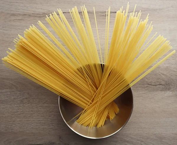 Raw Italian Spaghetti Bowl Wooden Background — Fotografia de Stock