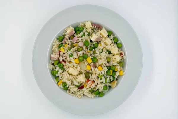 Italian Cold Rice Salad, Riso Freddo. Fresh and healthy summer salad on white background. Top view