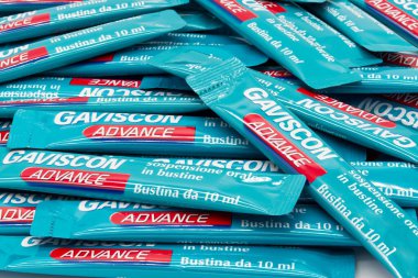 Bologna - Italy - July 20, 2022: Gaviscon Advance antacid sachet for heartburn and indigestion. Background.