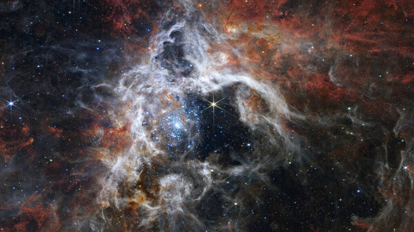 The Tarantula Nebula by Webb Space Telescope. Elements of this picture furnished by NASA