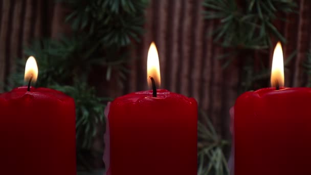 Red Christmas Candle Light Burning Wooden Background — Stock Video