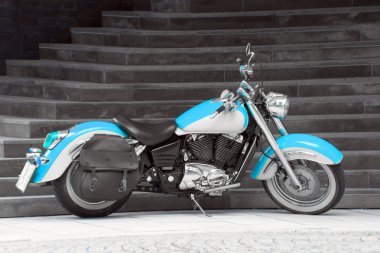 Motorbike in turquoise clipart