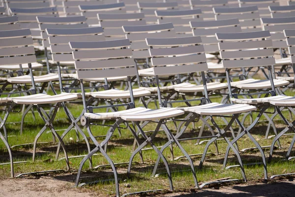 Empty chairs in an outdoor theater