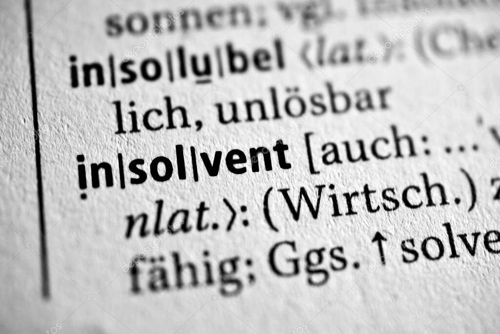Insolvent - Black and white text in a dictionary 