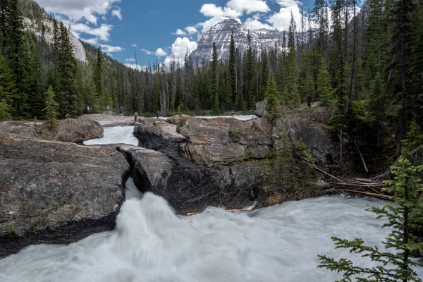 Long exposure at the natural bridge with strong flow in the Rockies