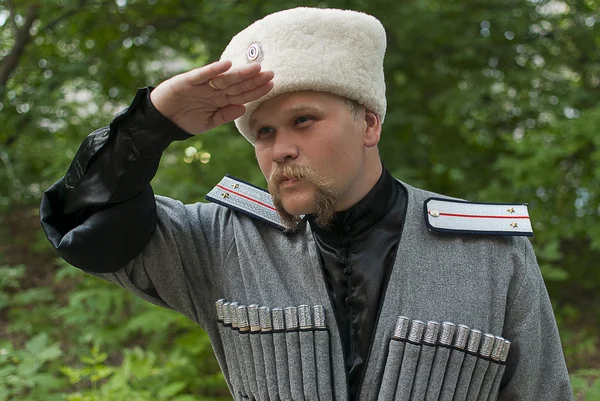 Fiatal férfi-egy kozák ruhák Stock Kép