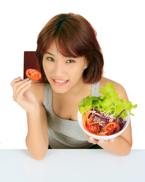 Isolated young asain woman with a bowl of vegetable salad — Stock Photo, Image