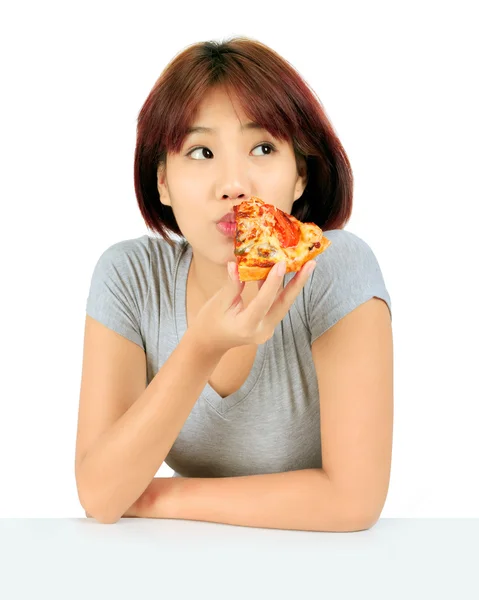 Isolated young asian woman with a piece of pizza — Stock Photo, Image