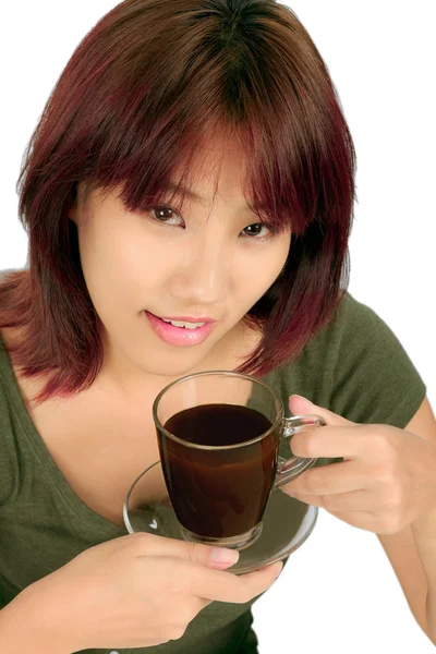 Isolated young asian woman with a cup of coffee — Stock Photo, Image