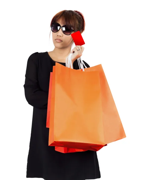 Young asian woman carries shopping bags — Stock Photo, Image