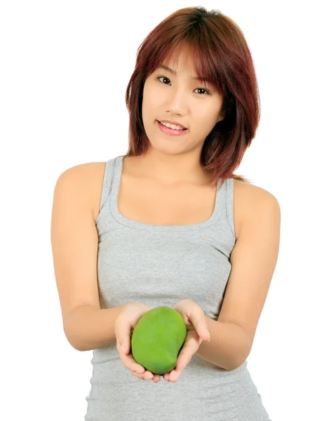 Geïsoleerde jonge Aziatische vrouw met een mango over Wit. — Stockfoto