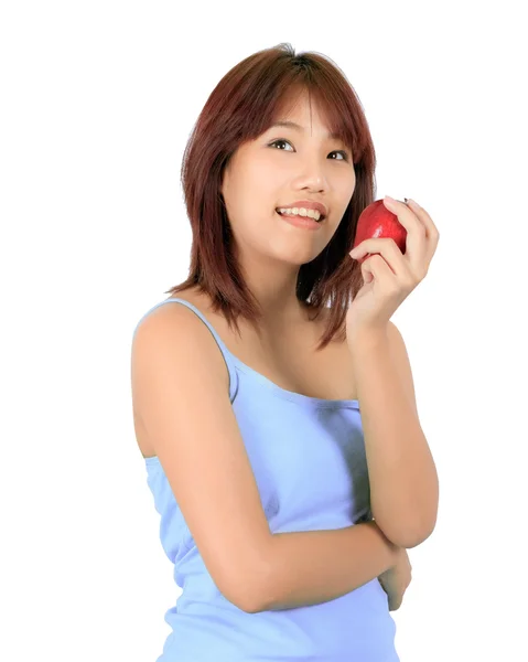 Isolierte junge asiatische Frau mit einem roten Apfel. — Stockfoto