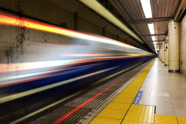 Japanese Subway Station with a Passing Train — Stock Photo, Image