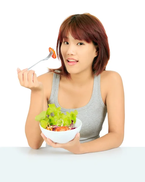 Izolované mladá Asiatka s miskou salátu — Stock fotografie
