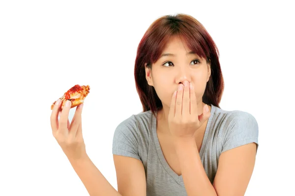 Isolated young asian woman with a piece of pizza — Stock Photo, Image