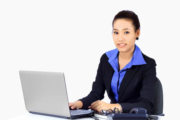 Young Business woman works on a desk — Stock Photo, Image