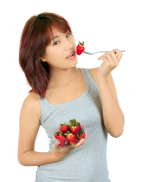 Isolated young asian woamsn with a box of strawberry — Stock Photo, Image