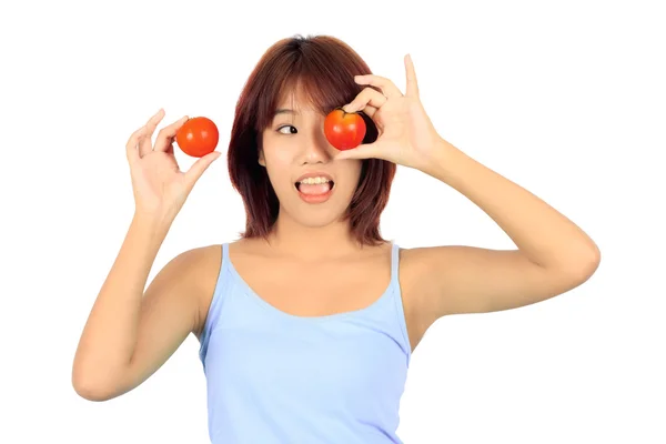 Jeune femme asiatique avec tomate — Photo