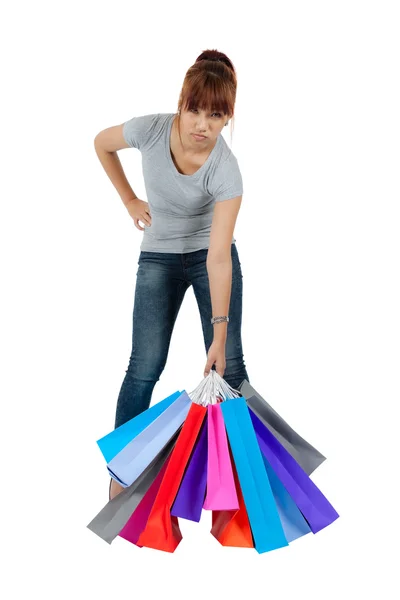 Mujer asiática joven aislada con bolsas de compras —  Fotos de Stock