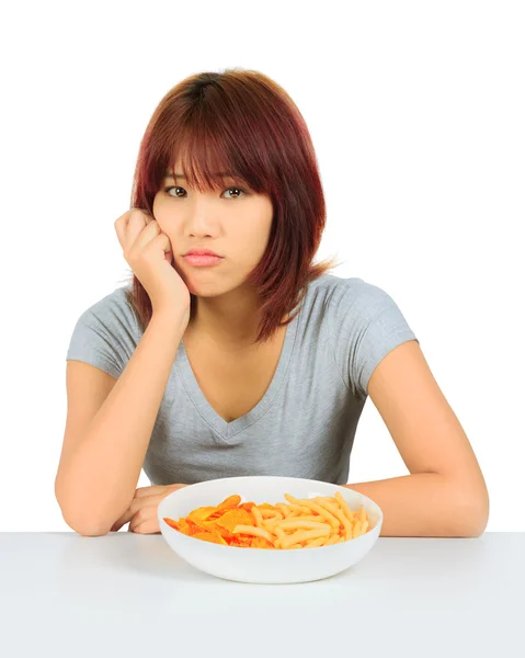Isolated young asian woman a plate of potato chip — Stock Photo, Image