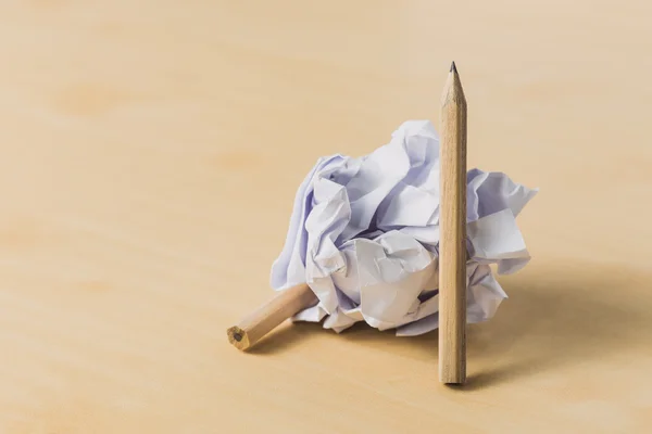 Pencils with a piece of crumpled paper ball — Stock Photo, Image