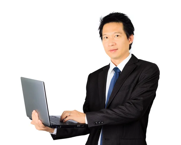 Asian business man with a laptop computer over white — Stock Photo, Image