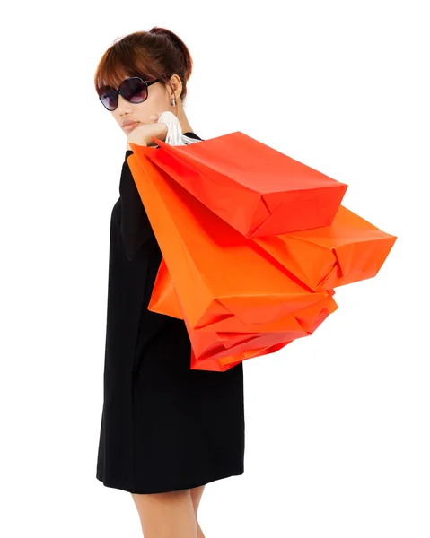 Mladá asijská žena s nákupní tašky — Stock fotografie