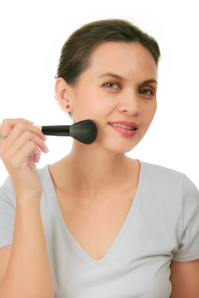 Middle age asian woman with make up brush. — Stock Photo, Image