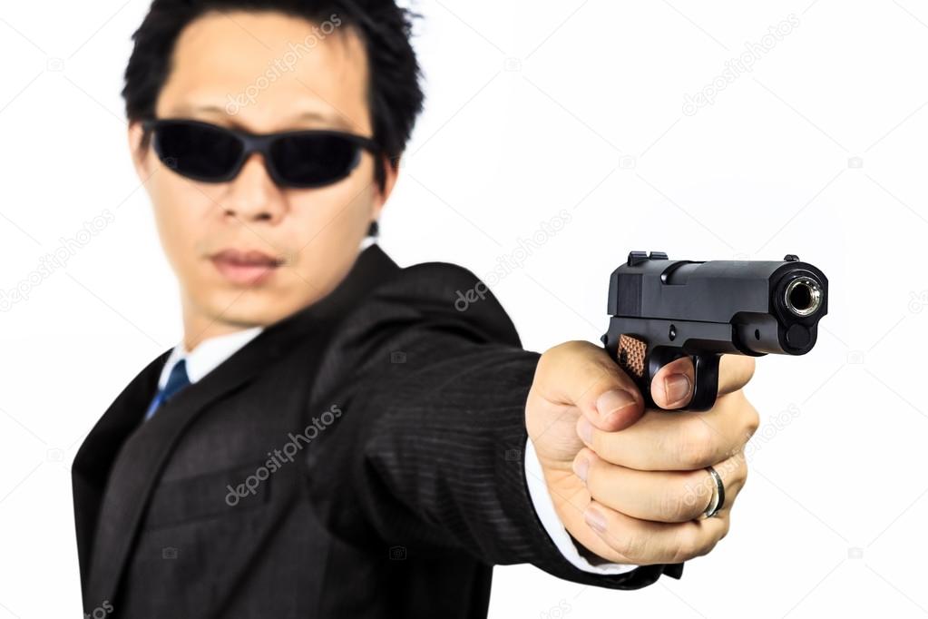 Asian male with a gun on white